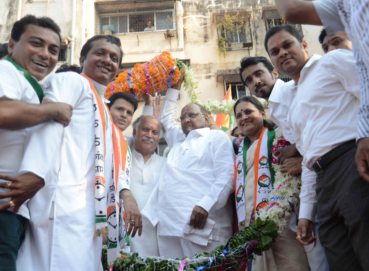 Election Campaign Public Meeting of Congress /NCP/PRP(Kawade)/ Republican Party of India (Democratic) Alliance MP.Candidate Gurudas Kamat with NCP Chief Sharad Pawar on the Last Public Rally at BEST Ground,Goregaon West, Mumbai.