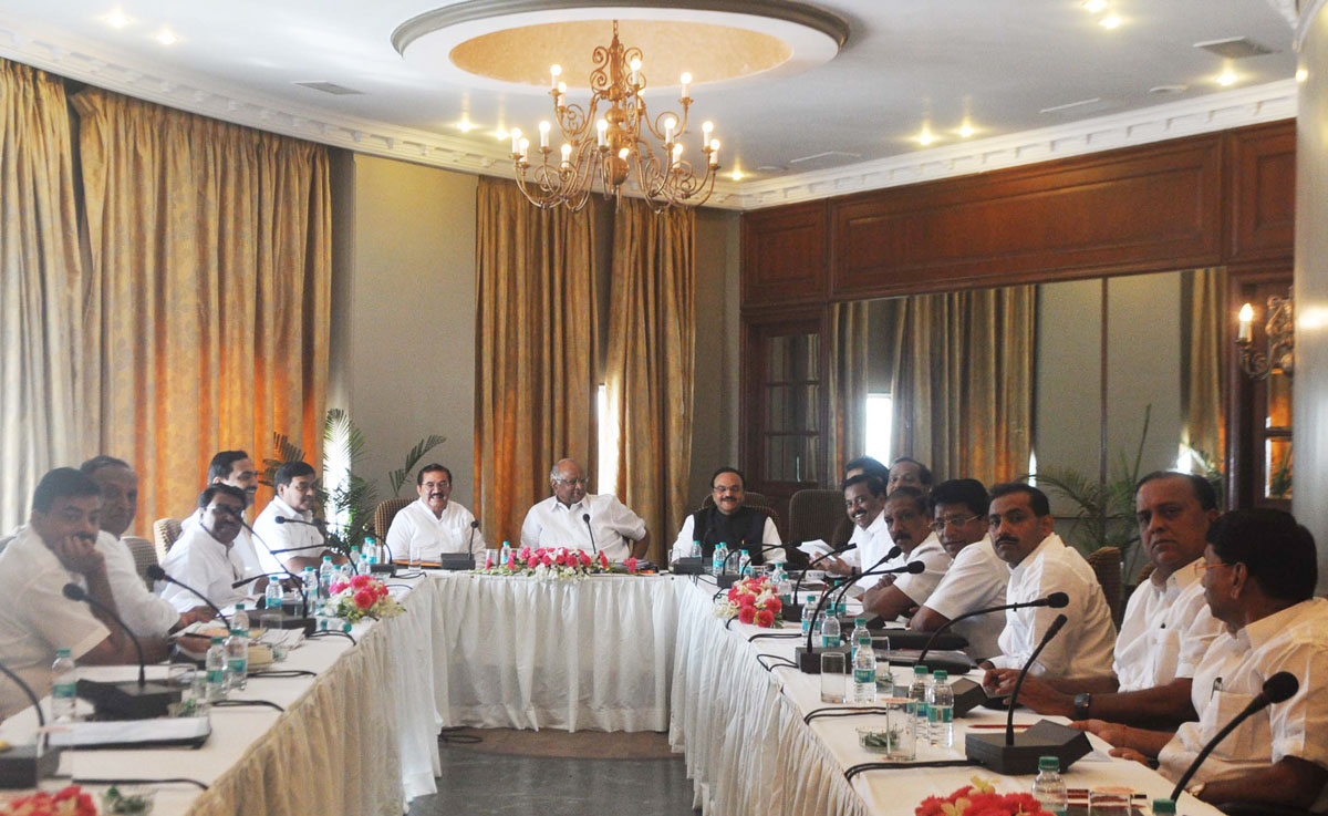 HON'BLE CENTRAL MINISTER SHARADCHANDRJI PAWAR WITH HIS N.C.P. TEAM AT NEHRU CENTER WORLI MUMBAI.