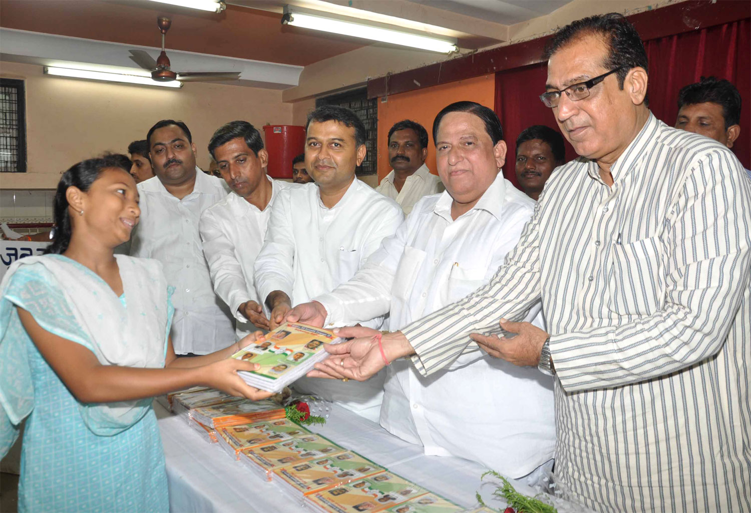 MLA MADHU CHAVAN BOOK DISTRIBUTION AT TARDEO.