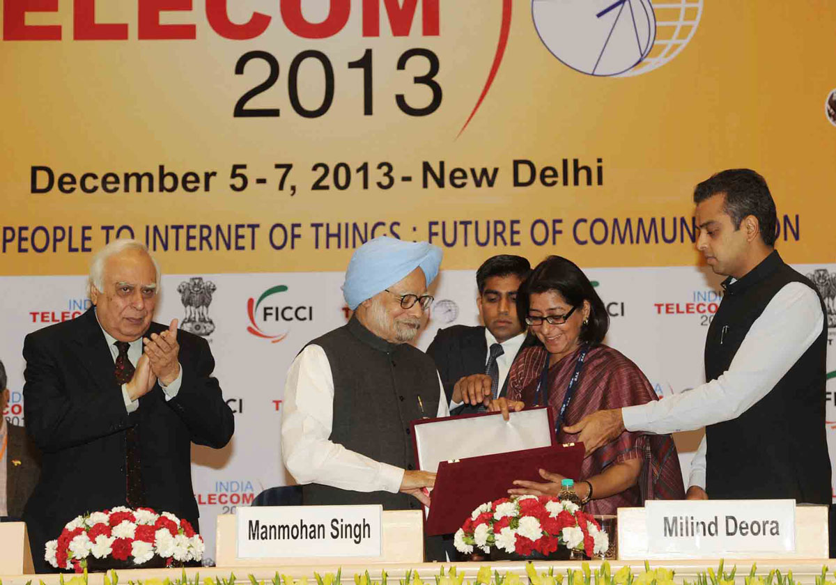 The Prime Minister Dr. Manmohan Singh,Union Minister For Communications & Information Technology and Law & Justice Kapil Sibal and The Minister Of State For Communications & Information Technology and Shipping,Shri Milind Deora At New Delhi.