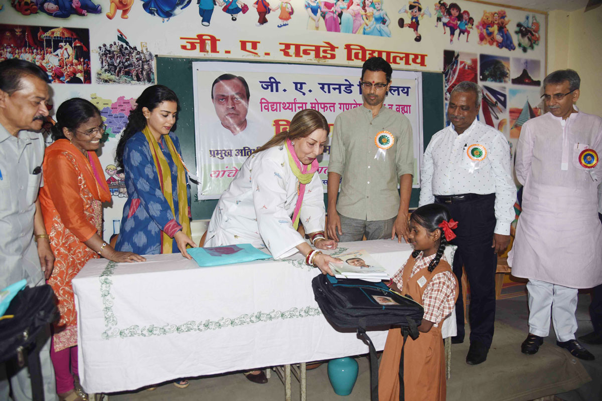In memory of Late Leader Murlibhai Deora School Bags,Uniforms & Note Books Distributed to the Students of Ranade School.