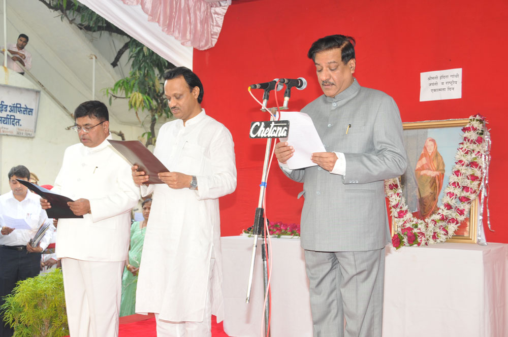 Chief Minister Pritviraj Chavan & Dy CM Ajitdada Pawar Paying Tribute to Late Prime Minister of India Smt.Indiraji Gandhi on the occasion of her Birth Anniversary At Mantralaya.
