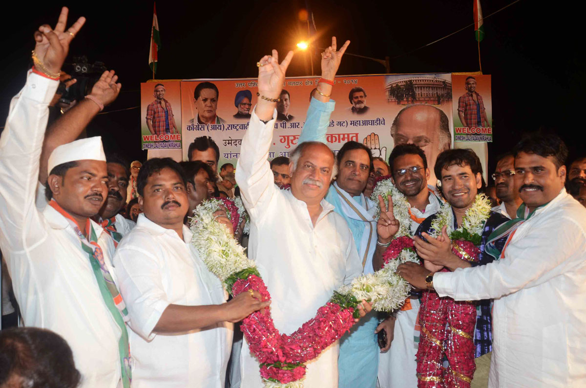 Election Campaign Public Meeting of Congress /NCP/PRP(Kawade)/ Republican Party of India (Democratic) Alliance MP.Candidate Gurudas Kamat with Bhojpuri Actor & Singer Dinesh Lal Yadav (Nirahua) at Behrambaug Jogeshwari West.