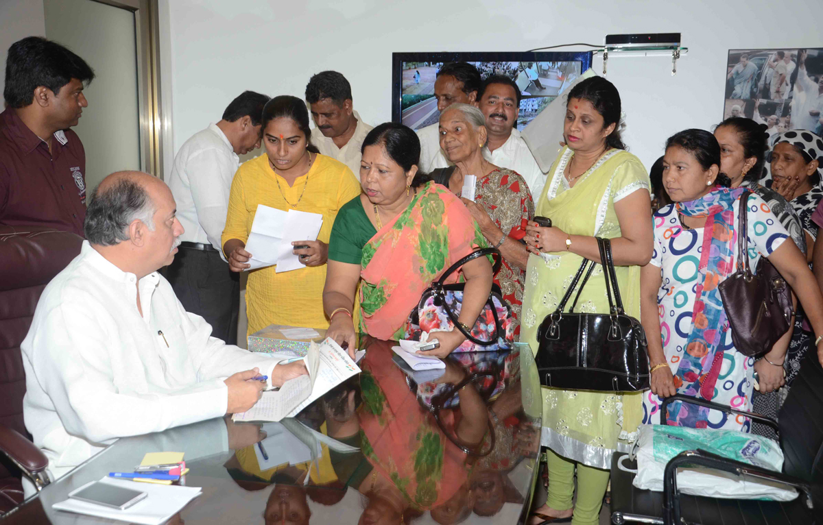 AICC.GEN.SEC.& MP.GURUDAS KAMAT JANTA DARBAR AT D.N.NAGAR ANDHERI.