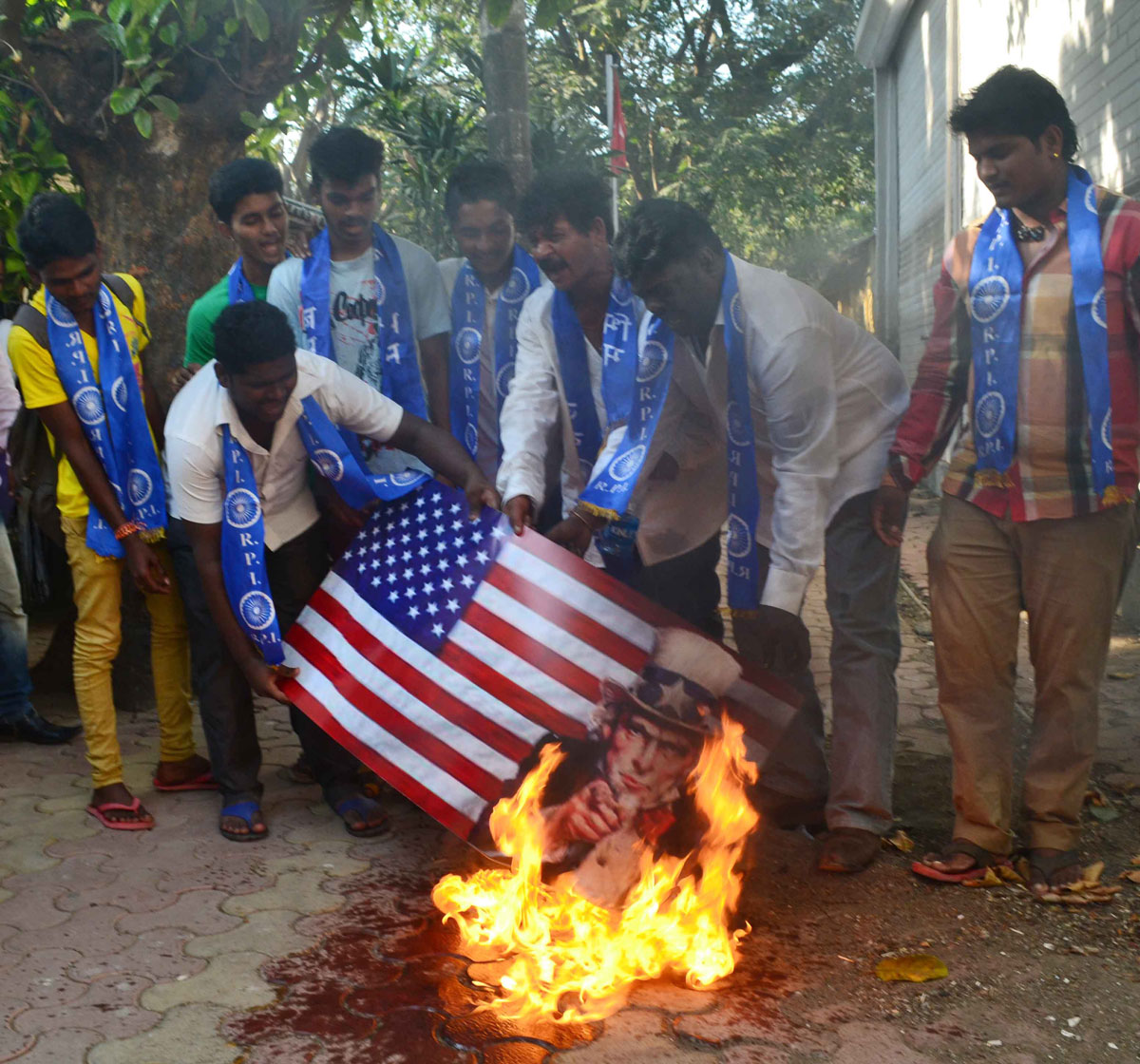 RPI party workers protest against USA security on Devyani Khobragade issue.