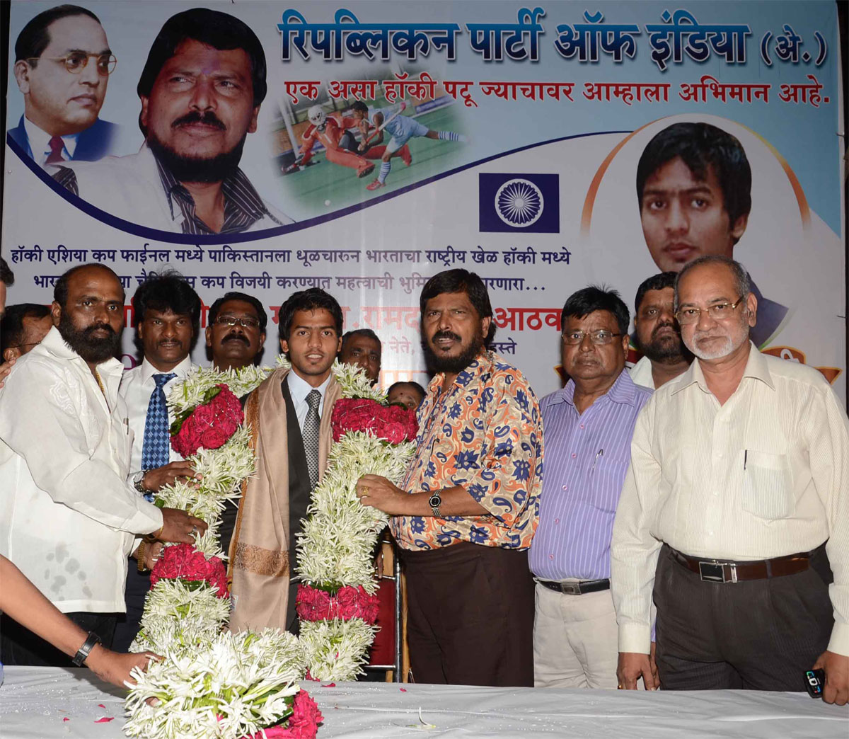 RPI PRESIDENT & EX.M.P. RAMDAS ATHAWALE HOCKEY PLAYER YURAJ VALMIKI & COACH DHANRAJ PILLE AT CHAITY BHOOMI DADAR
