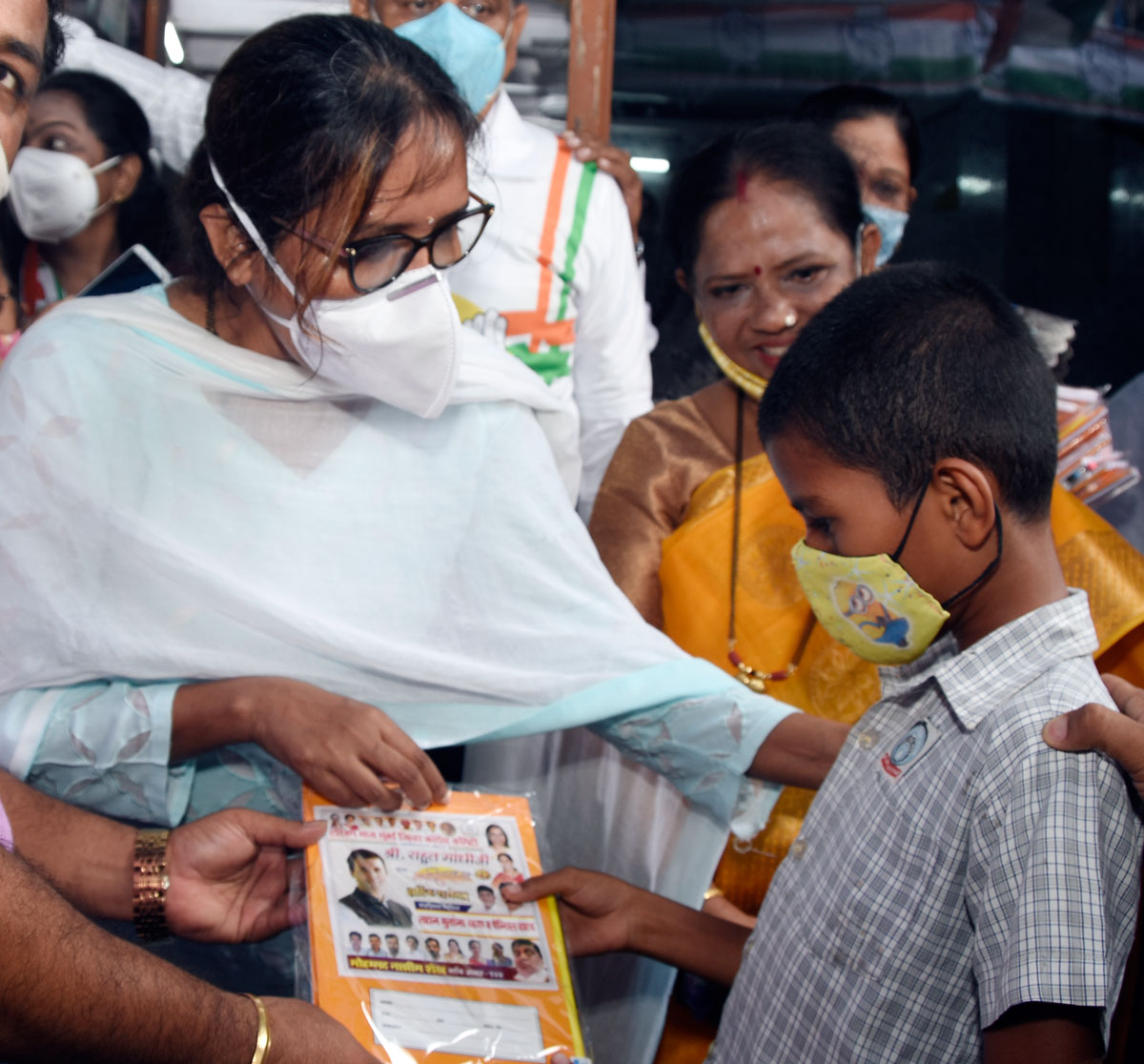 Minister Varshatai Gaikwad in Dharavi on occasion of Congress Party Leader MP Rahul Gandhi Birthday.