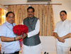 CHIEF MINISTER PRITHVIRAJ CHAVAN WISHING HAPPY BIRTHDAY TO MINISTER NARAYANRAO RANE ON OCCASION VIDHAN SABHA PRESIDENT DILIP VALSE PATIL AT SHANMUKHANAND HALL.