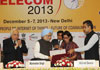 The Prime Minister Dr. Manmohan Singh,Union Minister For Communications & Information Technology and Law & Justice Kapil Sibal and The Minister Of State For Communications & Information Technology and Shipping,Shri Milind Deora At New Delhi.