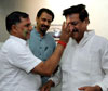 CHIEF MINISTER PRITHVIRAJ CHAVAN & MUMBAI CONGRESS PRESIDENT KRIPASHANKAR SINGH CELEBRATING HOLI. CHIEF MINISTER PRITHVIRAJ CHAVAN & MUMBAI CONGRESS PRESIDENT KRIPASHANKAR SINGH CELEBRATING HOLI.