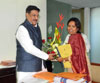 MINISTER VARSHATAI GAIKWAD  THANKING CHIEF MINISTER PRITHVIRAJ CHAVAN AT SAHIYADRI GUEST HOUSE.