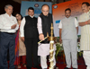Union Minister for Finance,Corporate Affairs and Information & Broadcasting Arun Jaitley with CM of Maharashtra Devendra Fadnavis at launching of the Pradhan Mantri Suraksha Bima Yojana, Atal Pension Yojana and Pradhan Mantri Jeevan Jyoti Bima Yojana.