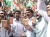 Mumbai Youth Congress President Ganeshkumar Yadav with Team Protest at CST Station against Minister Pankaja Munde Chikki Scam.