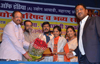 RPI PRESIDENT RAMDAS ATHWALE FELICITATED BY PADMASHREE MILIND KAMBLE,KALPANA SAROJ & 1st CLASS PASS CA STUDENT IN INDIA PREMA JAYAKUMAR AT BORIVALI PRABODHANKAR HALL.