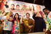 Congress Party Leader Gurudas Kamat & Cine Khisboo Sunder during Election Campaign Rally at Juhu.