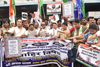 Mumbai Congress SC/ST Cell Protest outside Dadar Station on issue of IMen Burning  a copy of the India's Constitution at Parliament Street in Delhi.