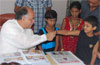EX.MINISTER & MP.GURUDAS KAMAT WITH CHILDRENS. EX.MINISTER & MP.GURUDAS KAMAT WITH CHILDRENS.